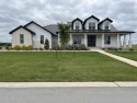 Beautiful custom built home by Southern Comfort Homes situated for sale in Kingsland Texas Llano County County on GolfHomes.com