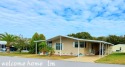 55+/1989/2 BD/2 BA/800 SQ FT/NEW FLOORING/LARGE SCREENED LANAI for sale in Zephyrhills Florida Pasco County County on GolfHomes.com