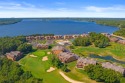 Beautiful Golf course condo overlooking hole #2 and pond for sale in Arkdale Wisconsin Adams County County on GolfHomes.com