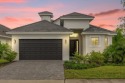 DREAM HOME ALERT -- Nestled within one of the most sought-after for sale in Davenport Florida Polk County County on GolfHomes.com