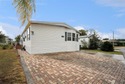 Welcome home to this beautifully maintained 3-bedroom, 2-bath for sale in Davenport Florida Polk County County on GolfHomes.com