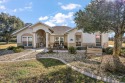 Stunning home, nestled in the picturesque community of The Lakes for sale in Lady Lake Florida Lake County County on GolfHomes.com