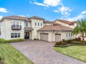 Nestled in the Eagle Creek golf community, this exquisite for sale in Orlando Florida Orange County County on GolfHomes.com