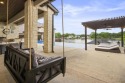 Meticulously built waterfront home with the prestigious gated for sale in Kingsland Texas Llano County County on GolfHomes.com