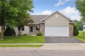 Enjoy one-level living in this end-unit townhome with golf for sale in Faribault Minnesota Rice County County on GolfHomes.com