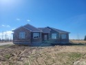 NEW CONSTRUCTION ON THE JOURNEY'S END GOLF COURSE! Sitting on a for sale in Shelley Idaho Bingham County County on GolfHomes.com