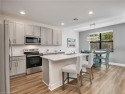 This LIKE-NEW home built in 2022 offers over 1,700 square feet for sale in Bonita Springs Florida Lee County County on GolfHomes.com