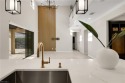 Discover refined luxury within the contemporary ambiance of this for sale in Estero Florida Lee County County on GolfHomes.com