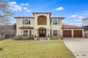 This luxurious Mediterranean-style home boasts of views of Lake for sale in Lago Vista Texas Travis County County on GolfHomes.com