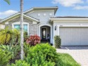 Live the Resort Lifestyle Every Day! Welcome to your dream for sale in Estero Florida Lee County County on GolfHomes.com