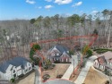 Master on Main, .91 acre, private, wooded, fenced, culdesac lot for sale in Woodstock Georgia Cherokee County County on GolfHomes.com