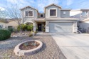 This two-story home boasts a beautifully landscaped backyard for sale in Queen Creek Arizona Maricopa County County on GolfHomes.com