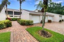 Welcome to your serene sanctuary in the heart of Naples. This for sale in Naples Florida Collier County County on GolfHomes.com