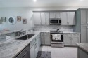 WATER VIEWS AND GOLF COURSE VIEWS, UPDATED KITCHEN AND BATHS for sale in Estero Florida Lee County County on GolfHomes.com