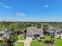 A truly spectacular Barker & Canady custom home is awaiting its for sale in Southport North Carolina Brunswick County County on GolfHomes.com