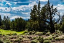 On the #7 Signature hole of the Tom Fazio Golf Course, above the for sale in Bend Oregon Deschutes County County on GolfHomes.com