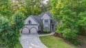 Stately custom European hard coat stucco traditional on for sale in Woodstock Georgia Cherokee County County on GolfHomes.com