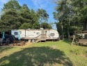 Two lots, one camper. For sale are lots 33 & 34.  Nice for sale in Horntown Virginia Accomack County County on GolfHomes.com