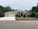 4/3.5/3 plus den, Pool home is located in very desirable Golf for sale in Spring Hill Florida Hernando County County on GolfHomes.com