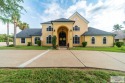 Tucked along the fairway in Rancho Escondido, this 4,037 sq ft for sale in Olmito Texas Cameron County County on GolfHomes.com