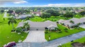 Not in a Flood Zone!  This move-in ready home is nestled at the for sale in Fort Myers Florida Lee County County on GolfHomes.com