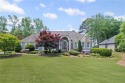 Prime Location and Luxury Living, this exquisite four-bedroom for sale in Cumming Georgia Forsyth County County on GolfHomes.com