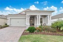 Located in the guard gated 55+ community of Four Seasons at for sale in Kissimmee Florida Osceola County County on GolfHomes.com