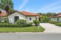 Wildcat Cove detached villa with lakefront view.   This single for sale in Estero Florida Lee County County on GolfHomes.com