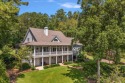 Gorgeous waterfront home located in the Exclusive Gated Golf, Georgia