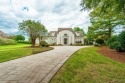 Step into the timeless elegance of this French Provincial for sale in Montgomery Alabama Montgomery County County on GolfHomes.com