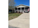 Welcome to this wonderful home with a large inviting 10 x 26 for sale in Brooksville Florida Hernando County County on GolfHomes.com