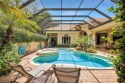 Welcome to this inviting cabana-style residence in Sanctuary at for sale in Bonita Springs Florida Lee County County on GolfHomes.com