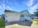 Better than Brand New and offered FULLY FURNISHED!!! This for sale in Greenbackville Virginia Accomack County County on GolfHomes.com