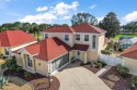 SPECTACULAR & UNIQUE 2 Story Designer Villa!  GOLF FRONT, POOL for sale in The Villages Florida Sumter County County on GolfHomes.com