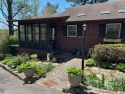 Charming and unique home nestled in Country Club Estates for sale in Hendersonville North Carolina Henderson County County on GolfHomes.com