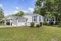 This home is nestled on a picturesque homesite on a quaint for sale in Hampstead North Carolina Pender County County on GolfHomes.com