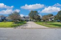 Welcome!  Open the door to this simply stunning executive home for sale in Panama City Florida Bay County County on GolfHomes.com