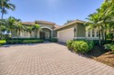 Enjoy the finest of Florida living in this stunning single-story for sale in West Palm Beach Florida Palm Beach County County on GolfHomes.com