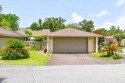 CORNER-LOT GARDEN OASIS! Nestled in the highly sought-after for sale in Niceville Florida Okaloosa County County on GolfHomes.com