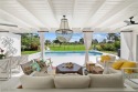Located in Moorings, one of Naples' most desirable and highly for sale in Naples Florida Collier County County on GolfHomes.com