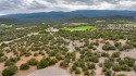 Nestled by a pristine golf course in the heart of a mountain for sale in Sandia Park New Mexico Bernalillo County County on GolfHomes.com