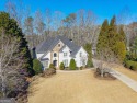 Welcome to this charming traditional home located in the for sale in Alpharetta Georgia Fulton County County on GolfHomes.com