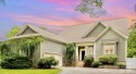 Enjoy beautiful water views of Lake Norman from this charming for sale in Mooresville North Carolina Iredell County County on GolfHomes.com