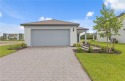 The Daniel is filled with open living areas. The spacious for sale in Lehigh Acres Florida Lee County County on GolfHomes.com