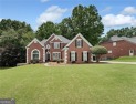 Welcome to this EXCEPTIONAL 5-bedroom, 3.5-bath home with a full for sale in Suwanee Georgia Forsyth County County on GolfHomes.com
