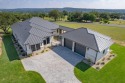 Enjoy a beautiful Texas Hill country drive to the exquisite for sale in Spicewood Texas Burnet County County on GolfHomes.com