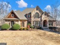Timeless European charm blended with today's touches in this all for sale in Braselton Georgia Gwinnett County County on GolfHomes.com