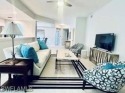 REDUCED!! COLONIAL LINKS COACH HOUSE w/GARAGE IN HERITAGE GREENS for sale in Naples Florida Collier County County on GolfHomes.com
