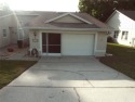 Very nicely maintained 2 bedroom, 2 bathroom , 2 car garage town for sale in Clermont Florida Lake County County on GolfHomes.com