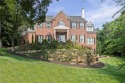 Custom built home on private, large, treed lot with lake views for sale in Loch Lloyd Missouri Cass County County on GolfHomes.com